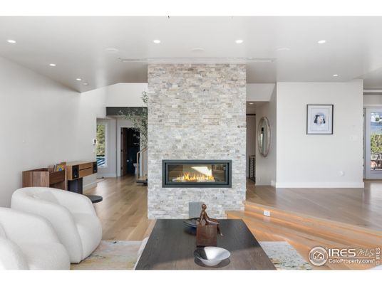 Fireplace, Interior, Recessed Lighting, Stone Walls, Wood Texture Flooring