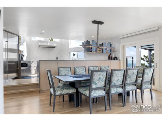 Dining room, Interior, Kitchen, Pendant Lights, Recessed Lighting, Stainless Steel Appliances, Wood Texture Flooring