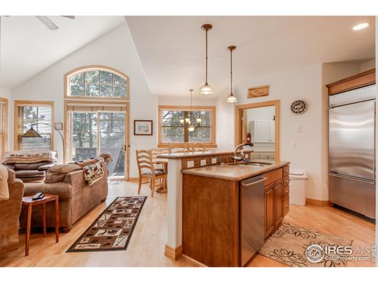 Dining room, Interior, Kitchen, Living room, Pendant Lights, Recessed Lighting, Stainless Steel Appliances, Wood Texture Flooring