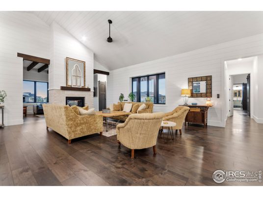Fireplace, Interior, Living room, Recessed Lighting, Stone Walls, Wood Texture Flooring