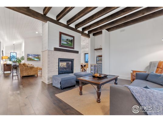 Fireplace, Interior, Living room, Pendant Lights, Recessed Lighting, Wooden Beams, Wood Texture Flooring