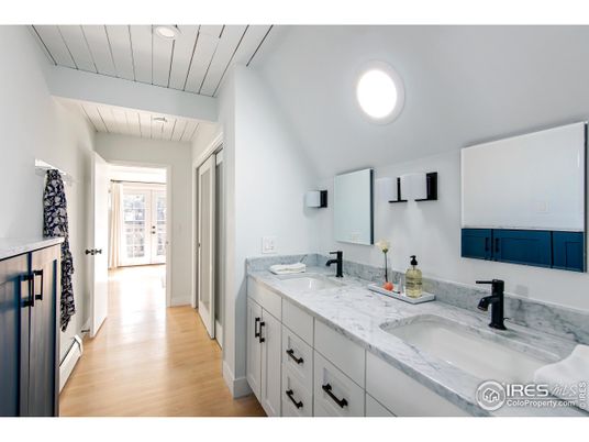 Bathroom, Dual Sink Vanities, Interior, Recessed Lighting, Wood Texture Flooring