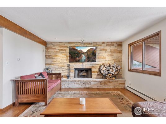 Fireplace, Interior, Recessed Lighting, Stone Walls, Wood Texture Flooring