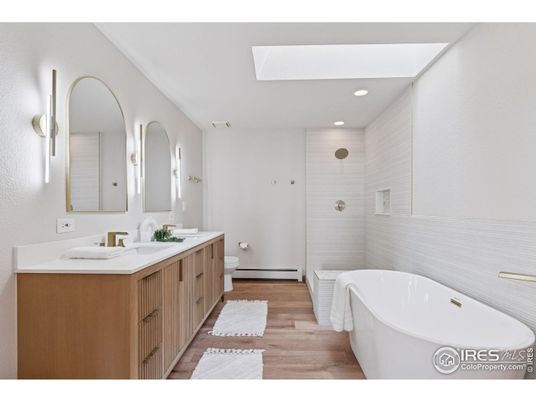 Bathroom, Dual Sink Vanities, Free Standing Baths, Interior, Recessed Lighting, Wood Texture Flooring