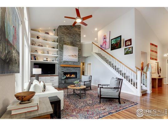 Fireplace, Interior, Living room, Recessed Lighting, Stone Walls, Wood Texture Flooring
