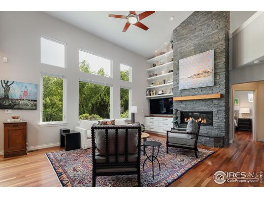 Fireplace, Interior, Living room, Recessed Lighting, Stone Walls, Wood Texture Flooring