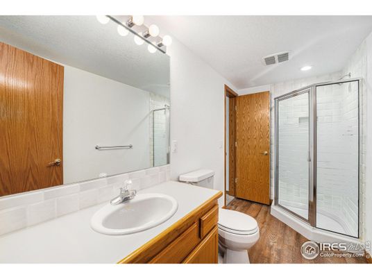Bathroom, Glass Shower, Interior, Recessed Lighting, Wood Texture Flooring