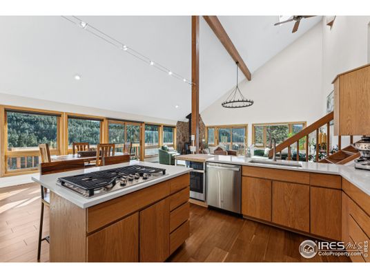 Dining room, Interior, Kitchen, Pendant Lights, Recessed Lighting, Stainless Steel Appliances, Wooden Beams, Wood Texture Flooring