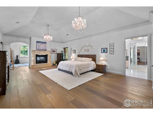 Bedroom, Chandelier, Fireplace, Interior, Wood Texture Flooring