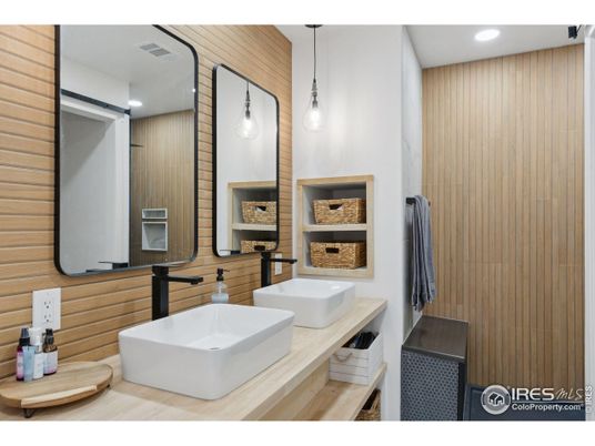 Bathroom, Dual Sink Vanities, Free Standing Baths, Interior, Pendant Lights, Recessed Lighting, Wooden Walls