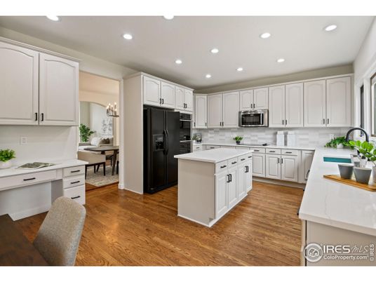 Chandelier, Dining room, Interior, Kitchen, Recessed Lighting, Stainless Steel Appliances, Wood Texture Flooring