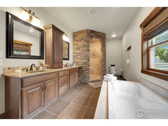 Bathroom, Dual Sink Vanities, Interior, Recessed Lighting, Stone Walls