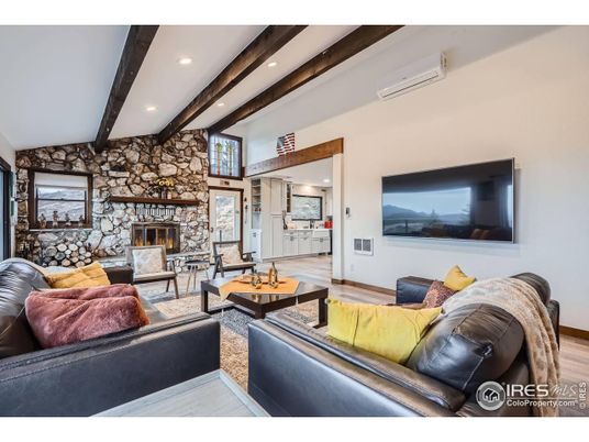 Fireplace, Interior, Living room, Recessed Lighting, Stone Walls, Wooden Beams, Wood Texture Flooring