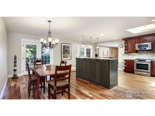 Chandelier, Dining room, Interior, Kitchen, Pendant Lights, Recessed Lighting, Stainless Steel Appliances, Wood Texture Flooring