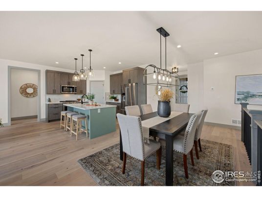 Dining room, Interior, Kitchen, Pendant Lights, Recessed Lighting, Stainless Steel Appliances, Wood Texture Flooring
