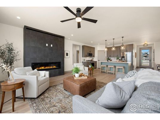 Fireplace, Interior, Kitchen, Living room, Pendant Lights, Recessed Lighting, Stainless Steel Appliances, Wood Texture Flooring
