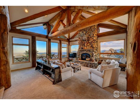 Fireplace, Interior, Living room, Recessed Lighting, Stone Walls, Water, Wooden Beams