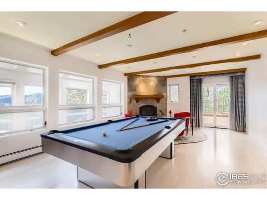 Billiard Table, Fireplace, Game Room, Interior, Recessed Lighting, Stone Walls, Wooden Beams, Wood Texture Flooring