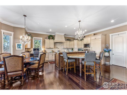Chandelier, Dining room, Interior, Kitchen, Recessed Lighting, Stainless Steel Appliances, Wood Texture Flooring