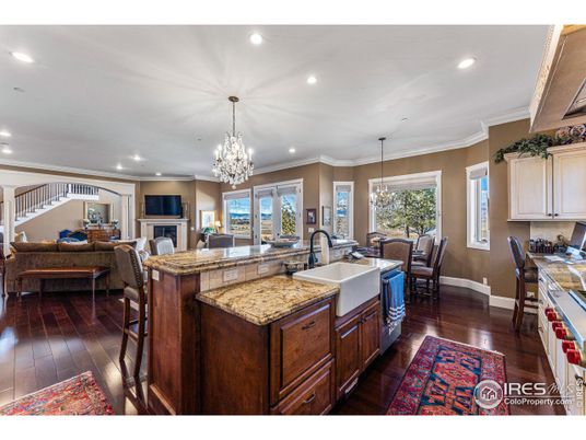 Chandelier, Dining room, Fireplace, Interior, Kitchen, Living room, Recessed Lighting, Wood Texture Flooring