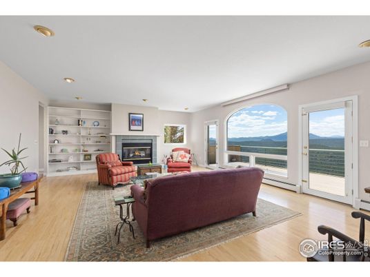 Fireplace, Interior, Living room, Recessed Lighting, Water, Wood Texture Flooring