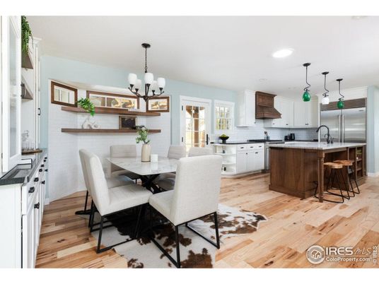 Chandelier, Dining room, Interior, Kitchen, Pendant Lights, Recessed Lighting, Stainless Steel Appliances, Wood Texture Flooring