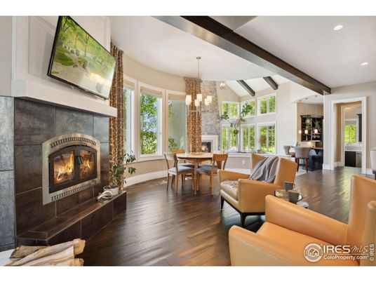Chandelier, Dining room, Fireplace, Interior, Living room, Recessed Lighting, Wood Texture Flooring
