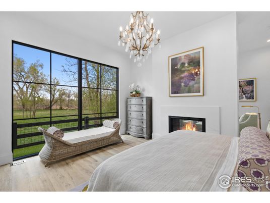 Bedroom, Chandelier, Fireplace, Interior, Recessed Lighting, Wood Texture Flooring