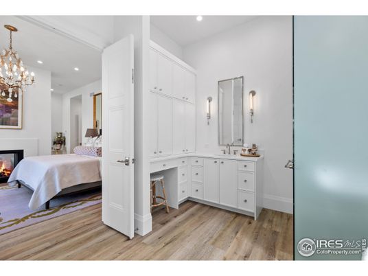 Bedroom, Chandelier, Fireplace, Interior, Pendant Lights, Recessed Lighting, Wood Texture Flooring