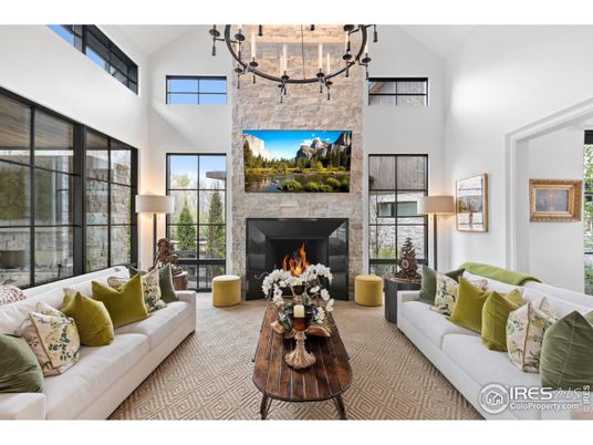 Chandelier, Fireplace, Interior, Living room, Stone Walls