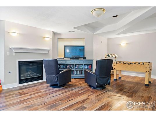 Fireplace, Game Room, Interior, Living room, Wood Texture Flooring