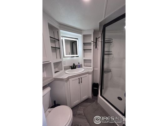 Bathroom, Glass Shower, Interior, Recessed Lighting, Tile Countertops