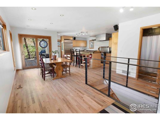 Dining room, Interior, Kitchen, Recessed Lighting, Stainless Steel Appliances, Wood Texture Flooring
