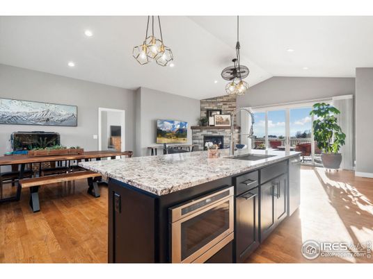 Dining room, Fireplace, Interior, Kitchen, Pendant Lights, Recessed Lighting, Wood Texture Flooring