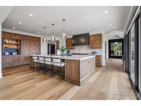 Interior, Kitchen, Marble Walls, Pendant Lights, Recessed Lighting, Wood Texture Flooring