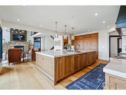 Fireplace, Interior, Kitchen, Living room, Pendant Lights, Recessed Lighting, Stone Walls, Wood Texture Flooring