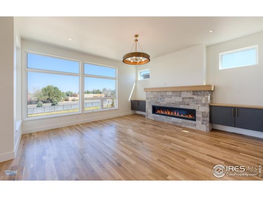 Empty room, Fireplace, Interior, Pendant Lights, Recessed Lighting, Wood Texture Flooring
