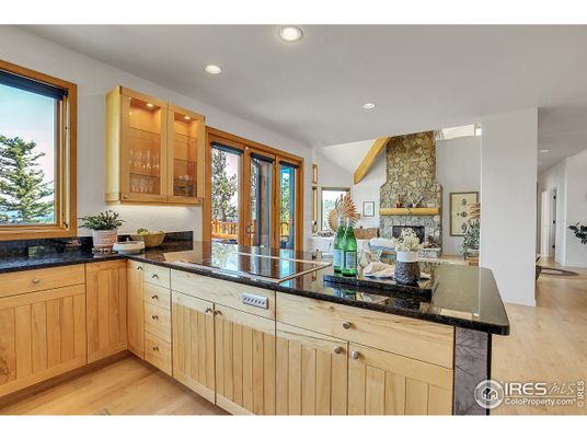 Fireplace, Interior, Kitchen, Recessed Lighting, Stone Walls, Wood Texture Flooring