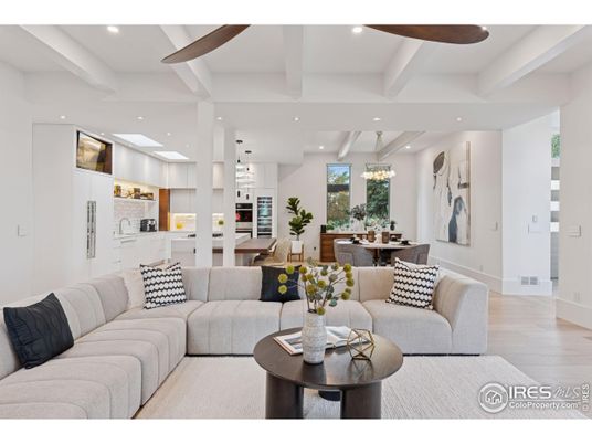 Chandelier, Dining room, Interior, Kitchen, Living room, Pendant Lights, Recessed Lighting, Stainless Steel Appliances, Wooden Beams, Wood Texture Flooring