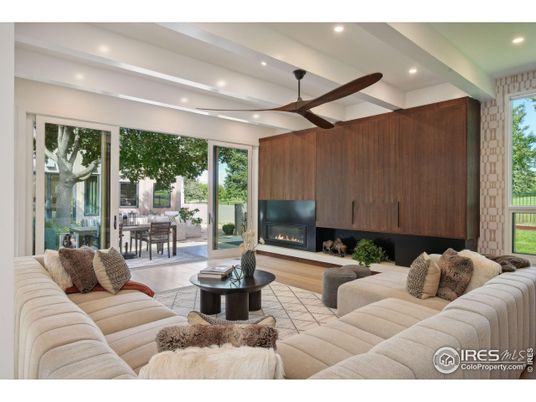 Dining room, Fireplace, Interior, Living room, Recessed Lighting, Wood Texture Flooring