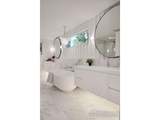 Bathroom, Dual Sink Vanities, Free Standing Baths, Interior, Marble, Marble Walls, Pendant Lights