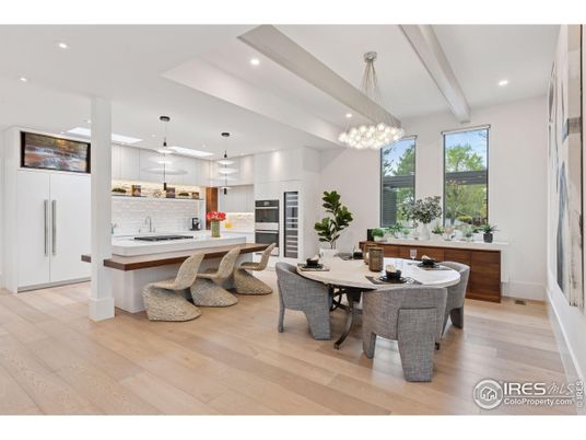 Chandelier, Dining room, Interior, Kitchen, Pendant Lights, Recessed Lighting, Stainless Steel Appliances, Wood Texture Flooring