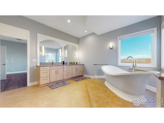 Bathroom, Dual Sink Vanities, Free Standing Baths, Interior, Recessed Lighting, Wood Texture Flooring