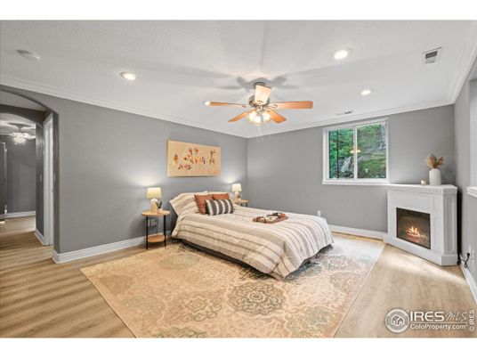 Bedroom, Fireplace, Interior, Recessed Lighting, Wood Texture Flooring