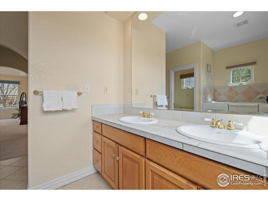 Bathroom, Dual Sink Vanities, Interior, Recessed Lighting, Tile Countertops