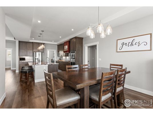 Dining room, Interior, Kitchen, Pendant Lights, Recessed Lighting, Stainless Steel Appliances, Wood Texture Flooring