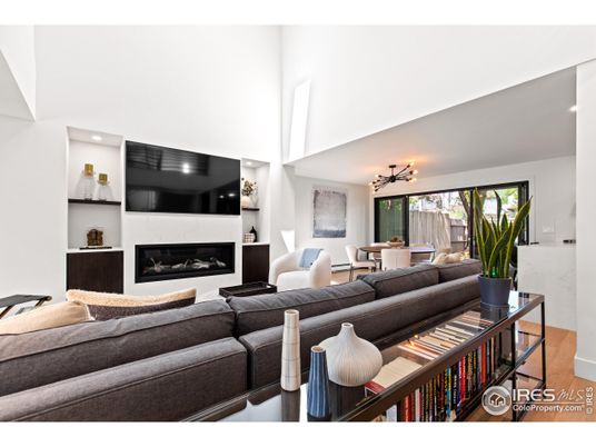Dining room, Fireplace, Interior, Living room, Recessed Lighting, Wood Texture Flooring