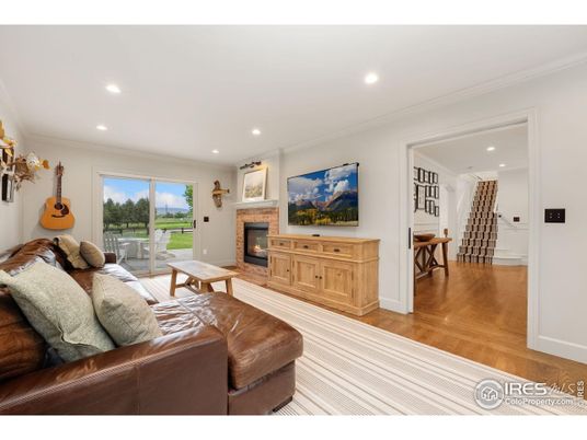 Dining room, Fireplace, Interior, Living room, Recessed Lighting, Wood Texture Flooring