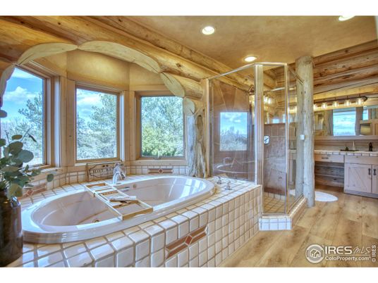 Bathroom, Glass Shower, Interior, Recessed Lighting, Tile Countertops, Wood Texture Flooring