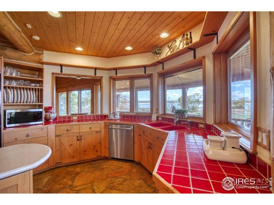 Interior, Kitchen, Recessed Lighting, Stainless Steel Appliances, Tile Countertops, Wooden Ceilings